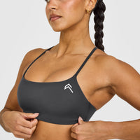 EasyLift™ Strappy Sports Bra with White Logo | Coal