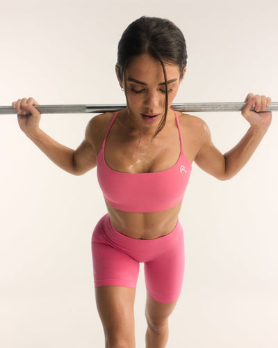 EasyLift™ Strappy Sports Bra with White Logo | Hot Girl Pink