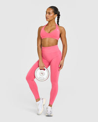 Effortless Seamless Halter Neck Sports Bra with White Logo | Hot Girl Pink