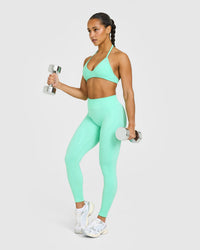 EnhanceLift™ Seamless Minimal Halter Neck Bralette with White Logo | Peppermint Green