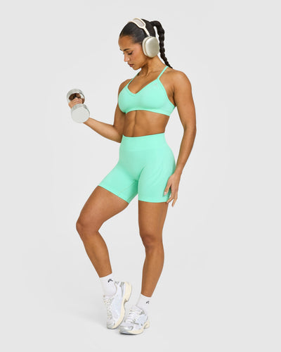 EnhanceLift™ Seamless Strappy Sports Bra with White Logo | Peppermint Green