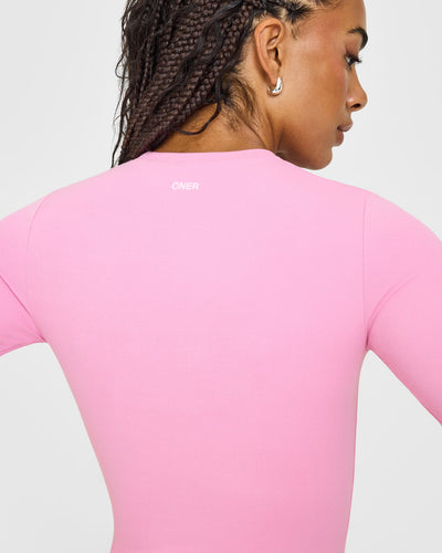 SoftMotion™ Long Sleeve Top with White Logo | Rose Pink