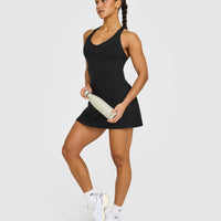 SoftMotion™ Racer Back Mid Vest with Built in Bra Shelf with White Logo | Black