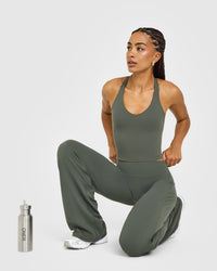 SoftMotion™ Racer Back Mid Vest with Built in Bra Shelf with White Logo | Dark Khaki
