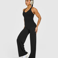 SoftMotion™ Racer Back Vest with Built in Bra Shelf with White Logo | Black