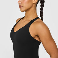 SoftMotion™ Racer Back Vest with Built in Bra Shelf with White Logo | Black