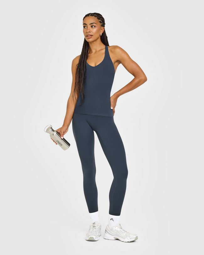 SoftMotion™ Racer Back Vest with Built in Bra Shelf with White Logo | True Blue