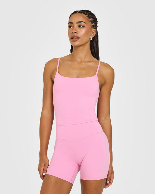 SoftMotion™ Strappy Mid Vest with Built in Bra Shelf with White Logo | Rose Pink