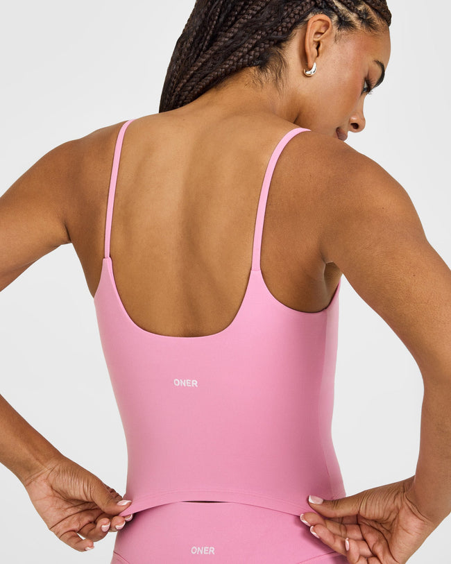 SoftMotion™ Strappy Mid Vest with Built in Bra Shelf with White Logo | Rose Pink