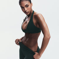 SoftMotion™ Minimal Halter Neck Bralette with Grey Logo | Emerald Noir