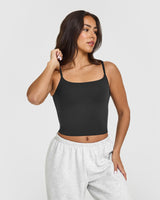 SoftMotion™ Strappy Mid Vest with Built in Bra Shelf with White Logo | Soft Black