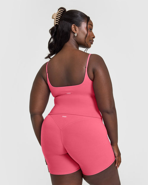 SoftMotion™ Strappy Mid Vest with Built in Bra Shelf with White Logo | Dark Velvet Pink