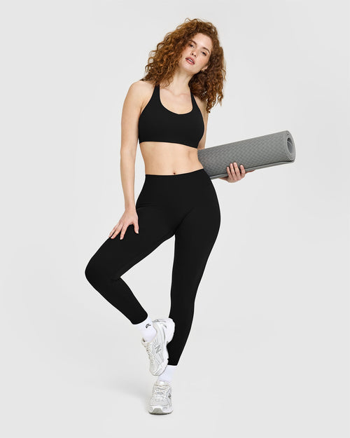 SoftMotion™ Sports Bra with White Logo | Black