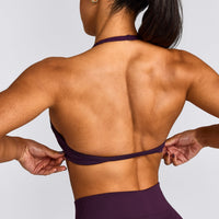EnhanceLift™ Seamless Minimal Halter Neck Bralette with Grey Logo | Blackberry Purple