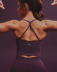EnhanceLift™ Seamless Strappy Racer Vest with Built in Bra Shelf with Grey Logo | Blackberry Purple