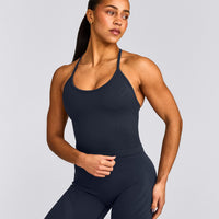 EnhanceLift™ Seamless Strappy Racer Vest with Built in Bra Shelf with Grey Logo | True Blue
