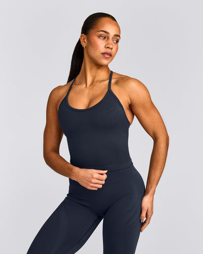 EnhanceLift™ Seamless Strappy Racer Vest with Built in Bra Shelf with Grey Logo | True Blue