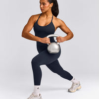EnhanceLift™ Seamless Strappy Racer Vest with Built in Bra Shelf with Grey Logo | True Blue