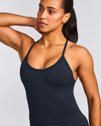 EnhanceLift™ Seamless Strappy Racer Vest with Built in Bra Shelf with Grey Logo | True Blue