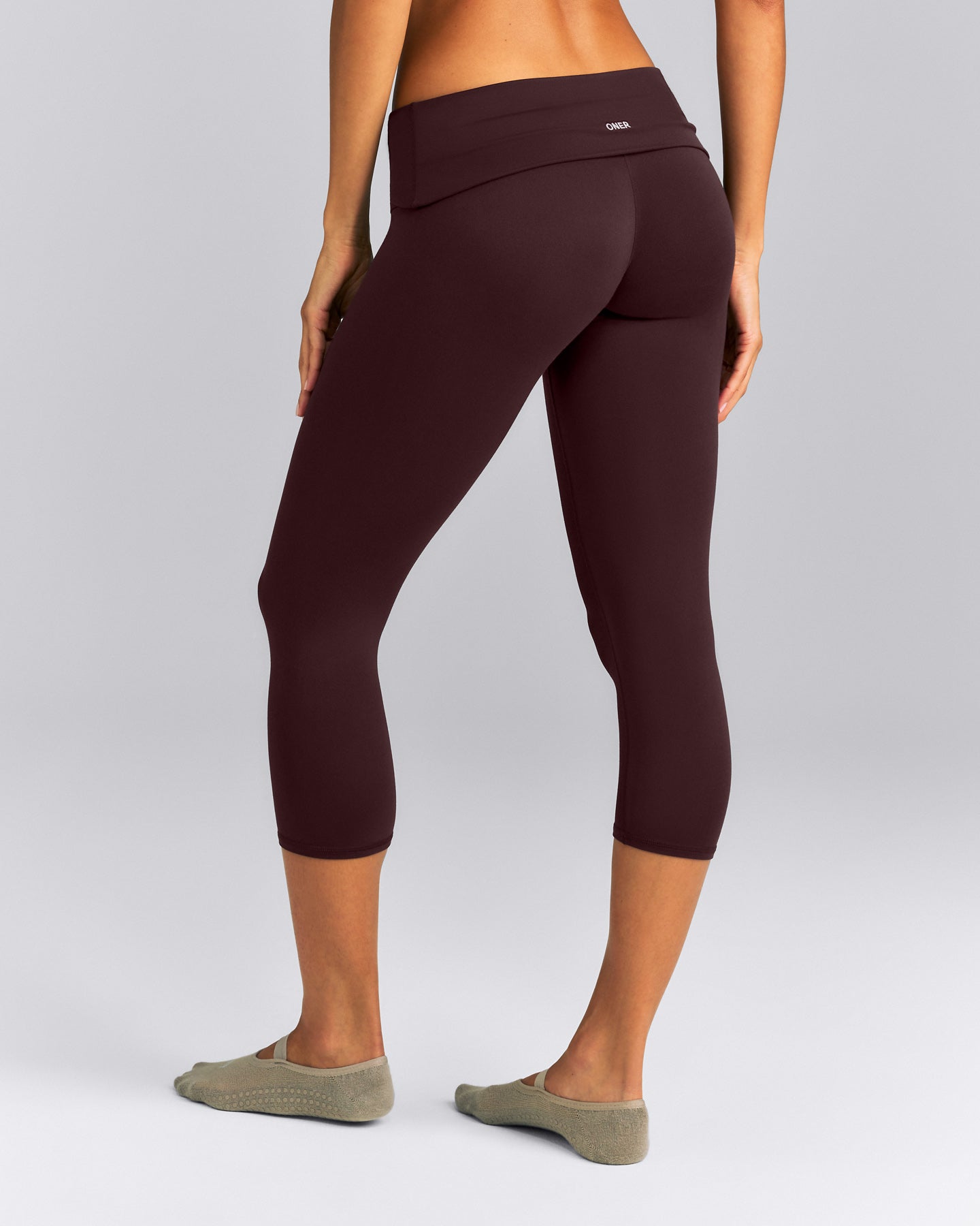 SoftMotion™ Fold Over Capri Leggings | Plum Brown