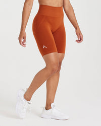 EffortlessLift™ Seamless Cycling Shorts with White Logo | Warm Copper