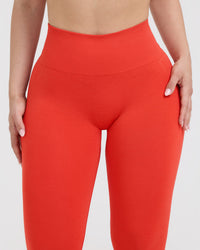 EffortlessLift™ Seamless Leggings with White Logo | Charged Orange