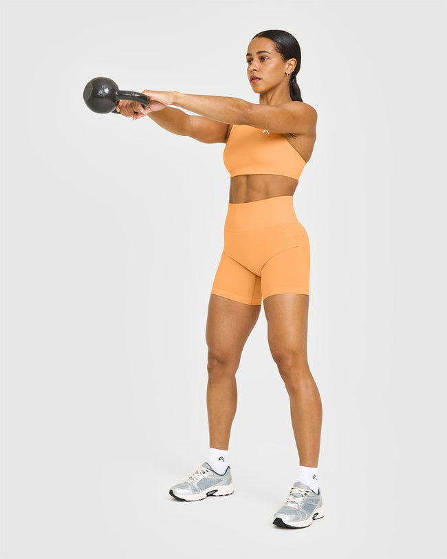 EffortlessLift™ Seamless Shorts with White Logo | Powdered Orange