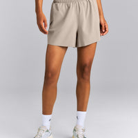 AirMove™ Lined Pocket Shorts 4" | Warm Sand