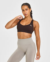 EasyLift™ Cross Back Sports Bra with White Logo | 70% Cocoa