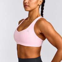 EasyLift™ Cross Back Sports Bra with Grey Logo | Chalk Pink
