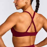 EasyLift™ Cross Back Sports Bra with Grey Logo | Ruby Red