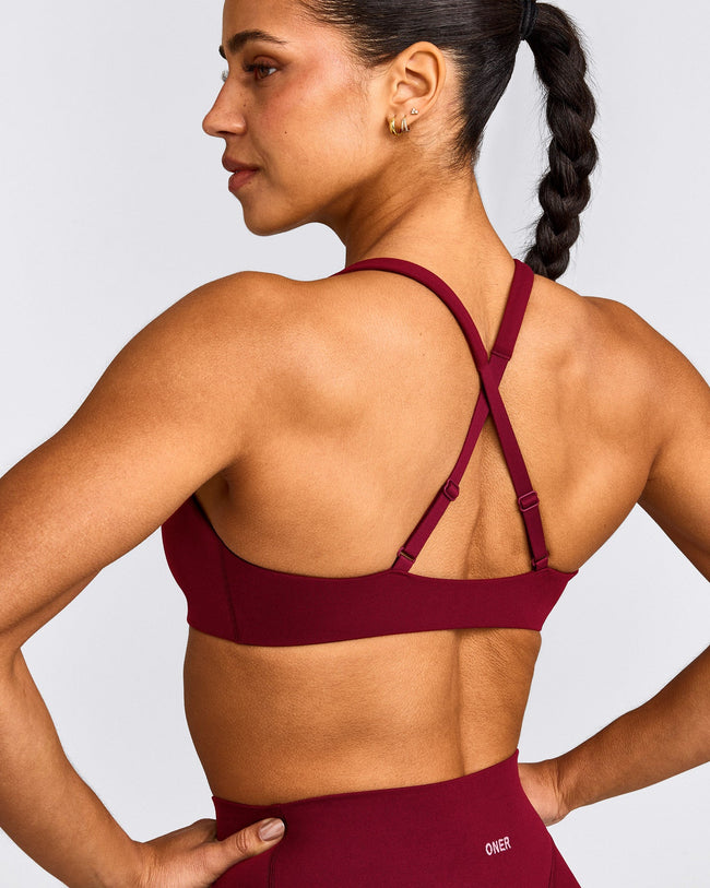 EasyLift™ Cross Back Sports Bra with Grey Logo | Ruby Red