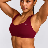 EasyLift™ Cross Back Sports Bra with Grey Logo | Ruby Red
