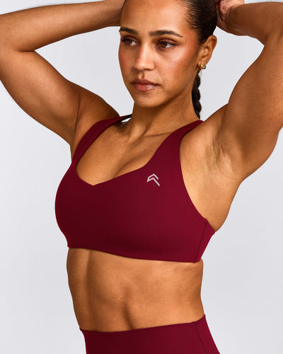 EasyLift™ Cross Back Sports Bra with Grey Logo | Ruby Red