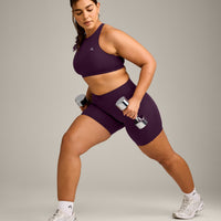 EasyLift™ High Neck Sports Bra with Grey Logo | Blackberry Purple
