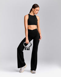 EasyLift™ High Neck Sports Bra with Grey Logo | Black