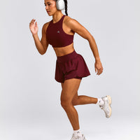 EasyLift™ High Neck Sports Bra with Grey Logo | Rosewood