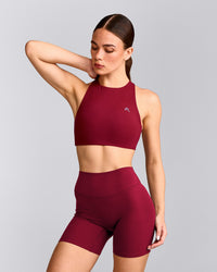 EasyLift™ High Neck Sports Bra with Grey Logo | Ruby Red