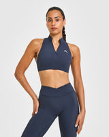 EasyLift™ Zip High Neck Sports Bra with White Logo | True Blue