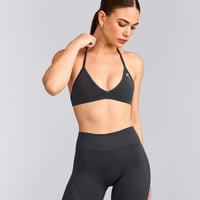 EnhanceLift™ Seamless Minimal Halter Neck Bralette with Grey Logo | Coal