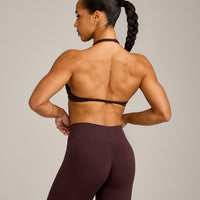 EnhanceLift™ Seamless Minimal Halter Neck Bralette with Grey Logo | Plum Brown