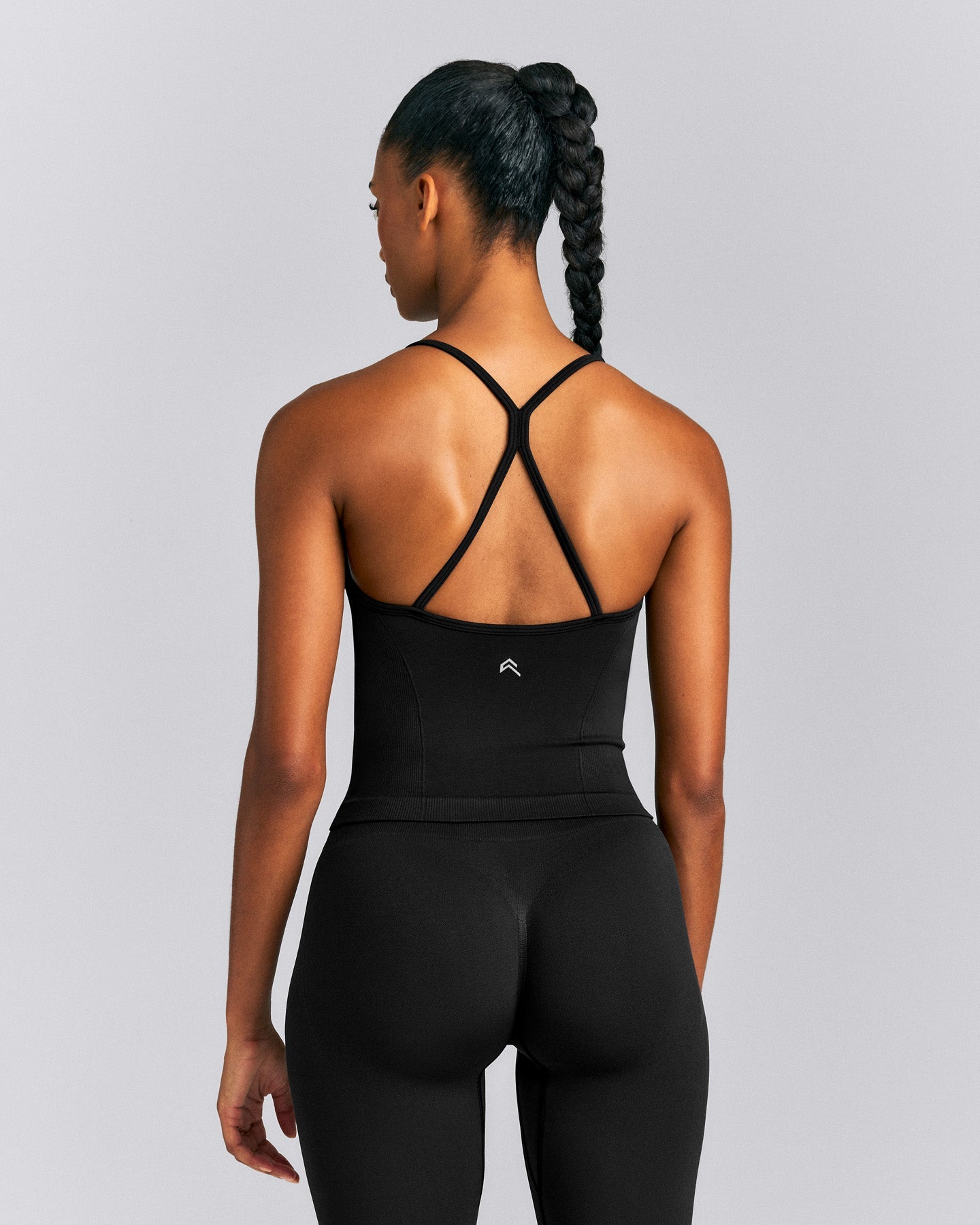 EnhanceLift™ Seamless Strappy Racer Vest with Built in Bra New Branding | Black
