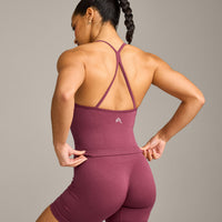 EnhanceLift™ Seamless Strappy Racer Vest with Built in Bra Shelf with Grey Logo | Burnt Maroon