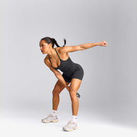 EnhanceLift™ Seamless Strappy Racer Vest with Built in Bra Shelf with Grey Logo | Coal