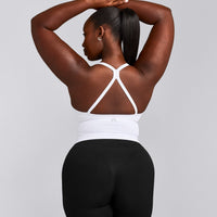 EnhanceLift™ Seamless Strappy Racer Vest with Built in Bra Shelf with Grey Logo | White