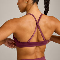 EnhanceLift™ Seamless Strappy Sports Bra with Grey Logo | Burnt Maroon
