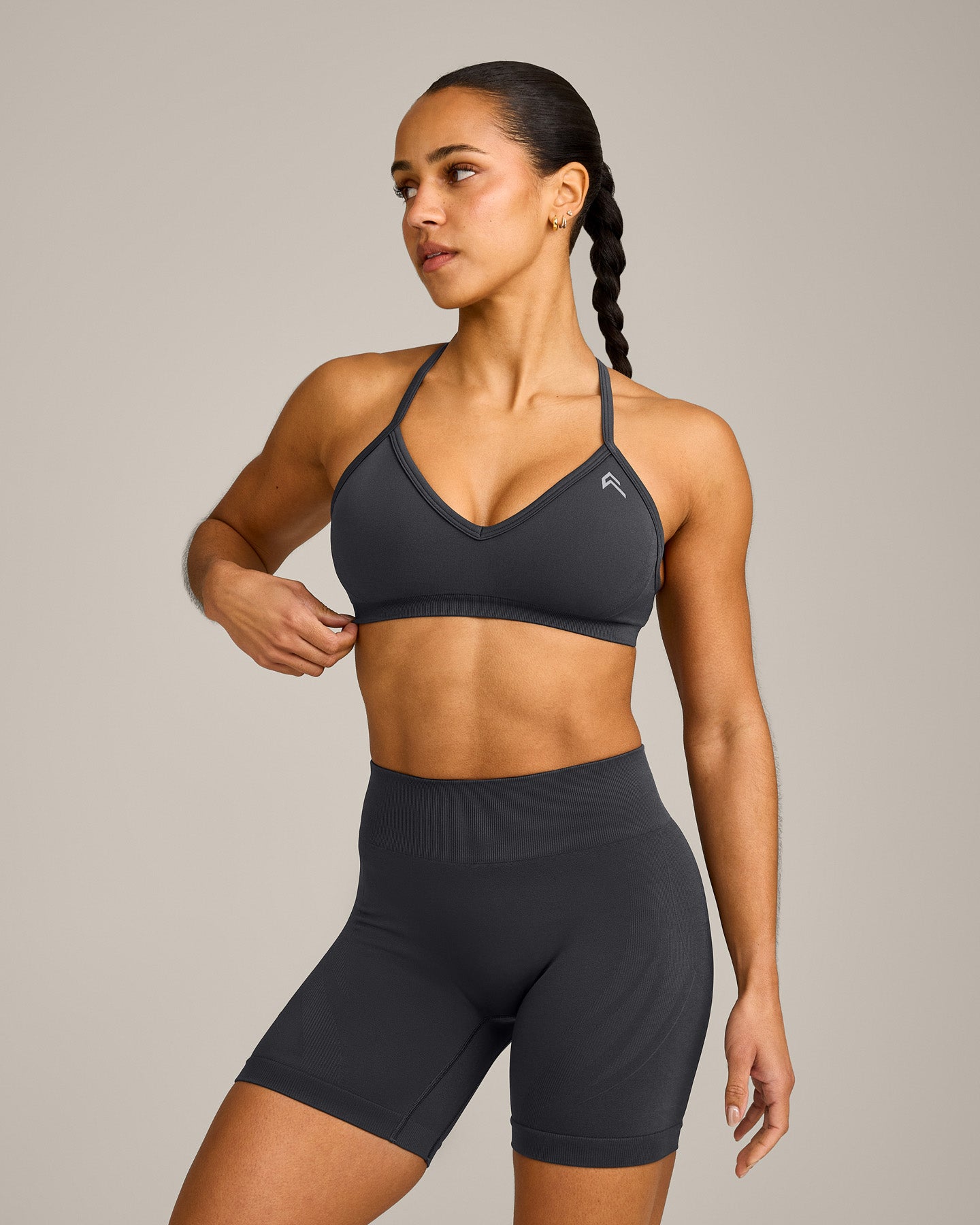 EnhanceLift™ Seamless Strappy Sports Bra with Grey Logo | Coal