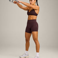 EnhanceLift™ Seamless Strappy Sports Bra with Grey Logo | Plum Brown