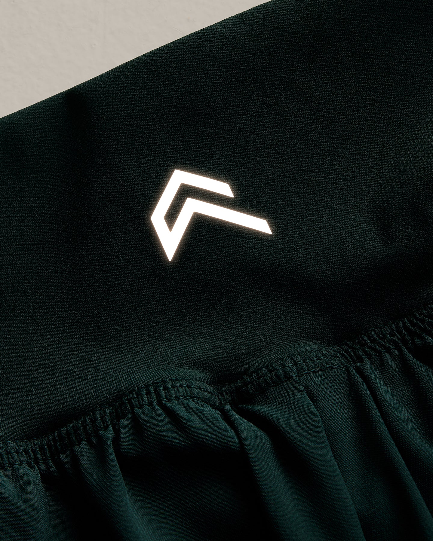 UnifiedMove Double Layer Shorts 5" with Reflective Logo | Racing Green