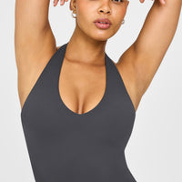 SoftMotion™ Halter Neck Mid Vest with Built in Bra Shelf with White Logo | Coal